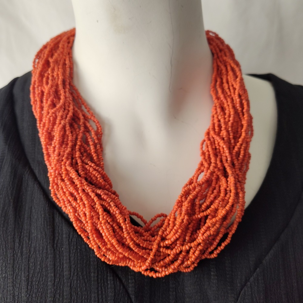 Orange beaded necklace twist hook loop costume fashion jewelry 1980's prop